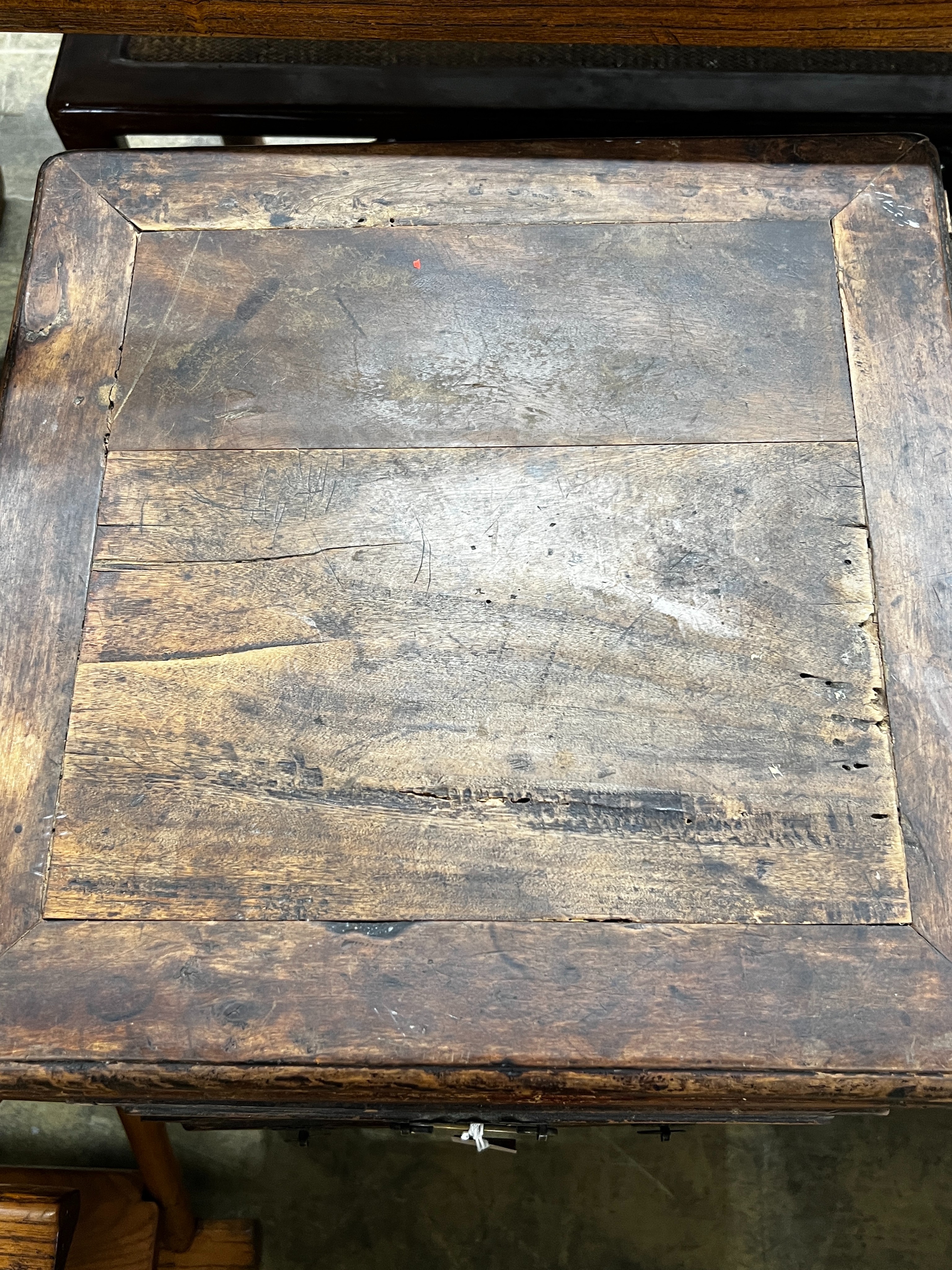 A Chinese lacquered wood three drawer side table, width 43cm, depth 44cm, height 77cm